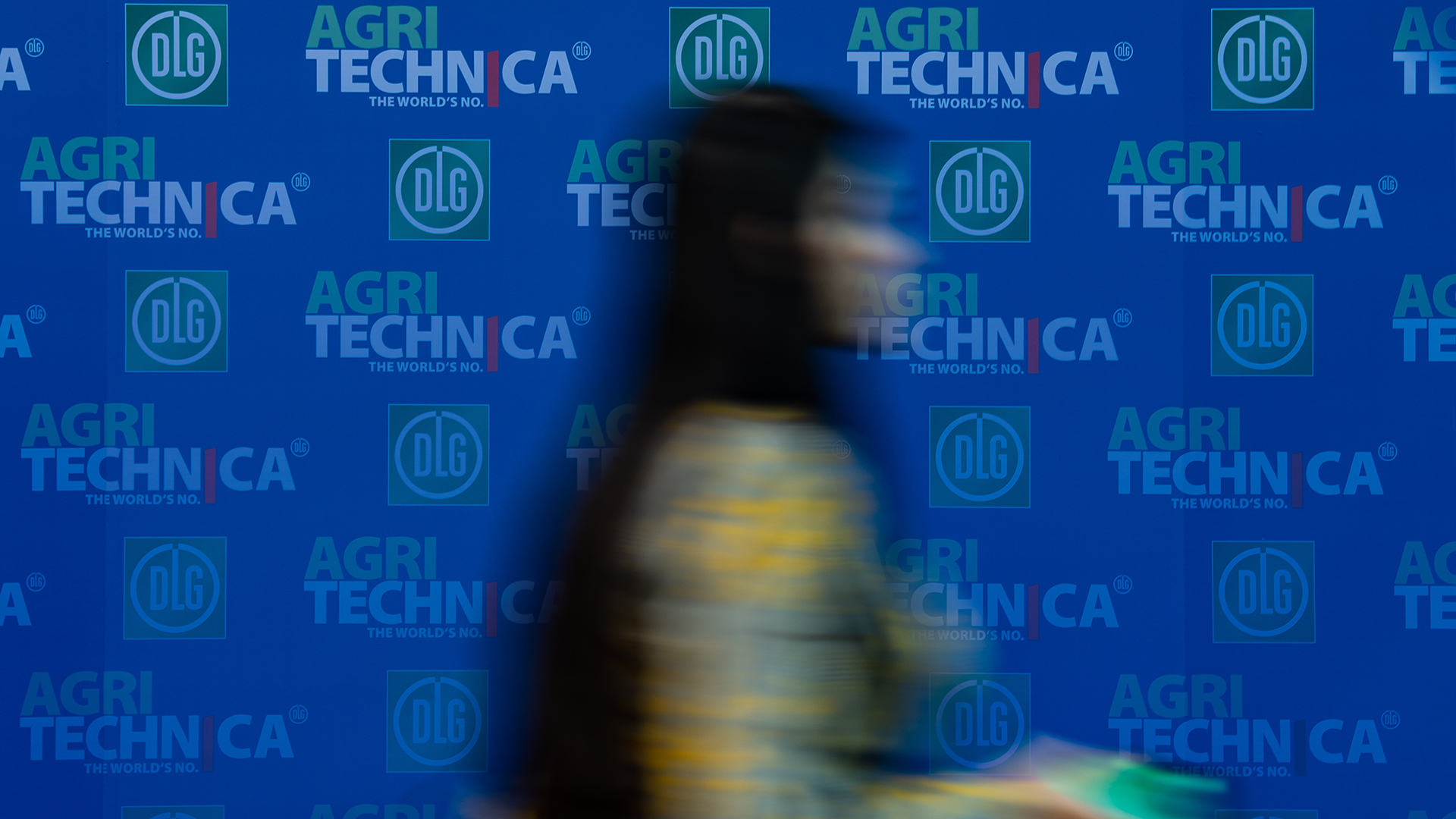 Woman in front of Agritechnica background